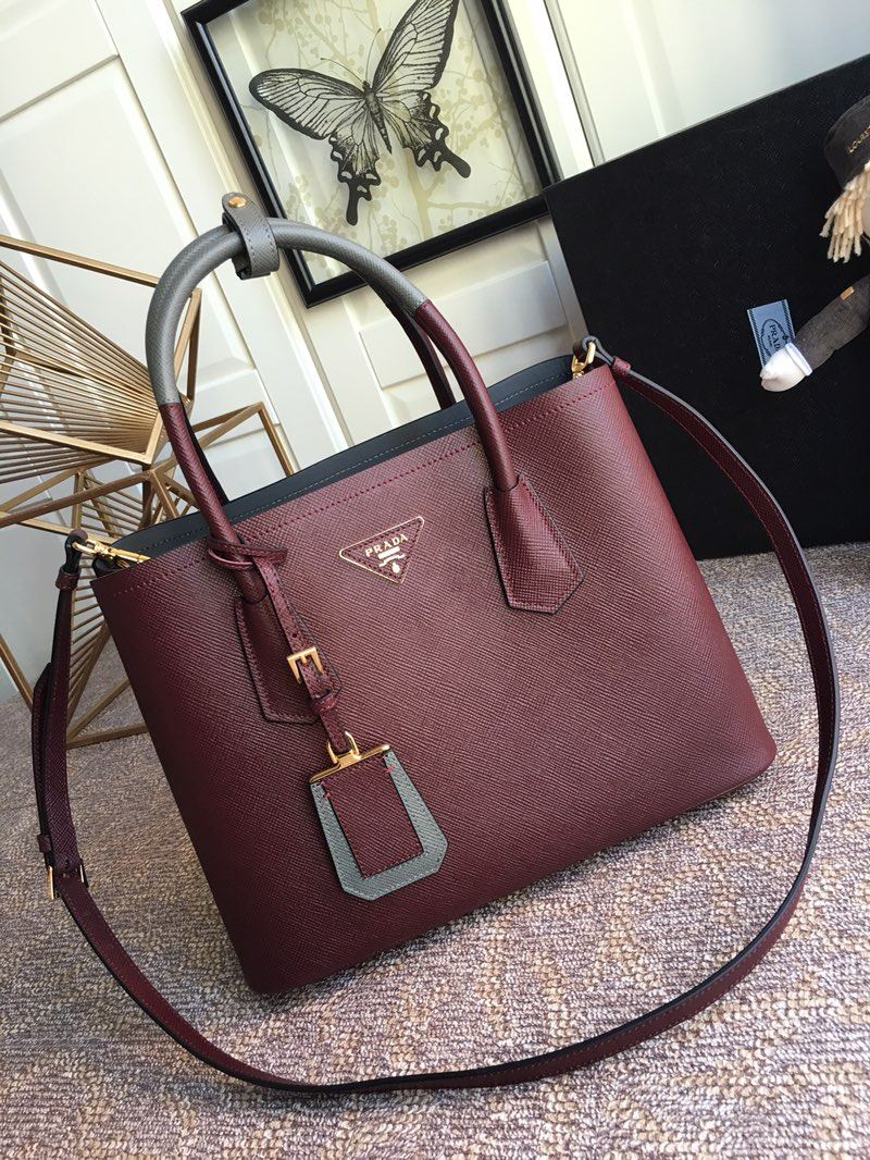 Pra*a top handle bags